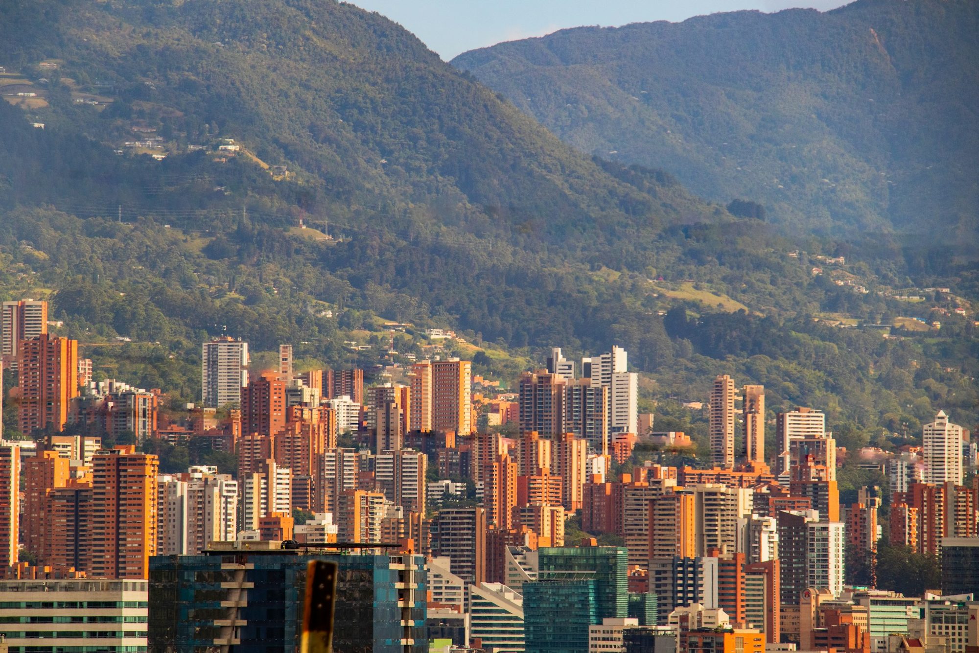 View over the Aburrá valley toward the green hills above Envigado